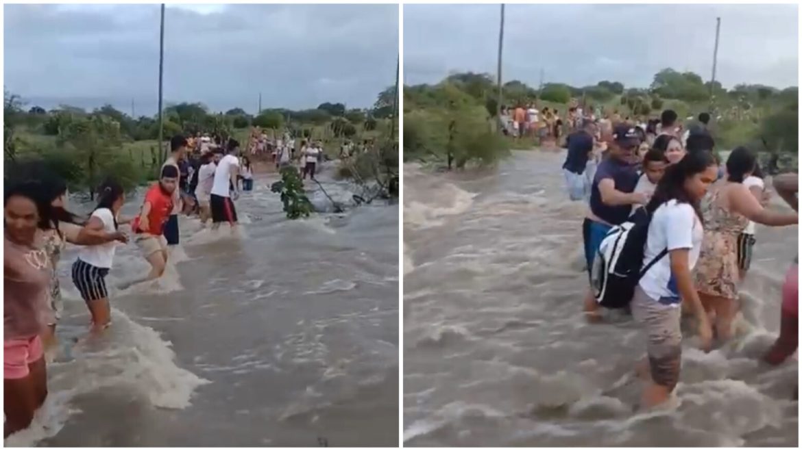 corrente-humana-ajuda-alunos-a-atravessar-riacho-em-retirolandia-apos-chuva